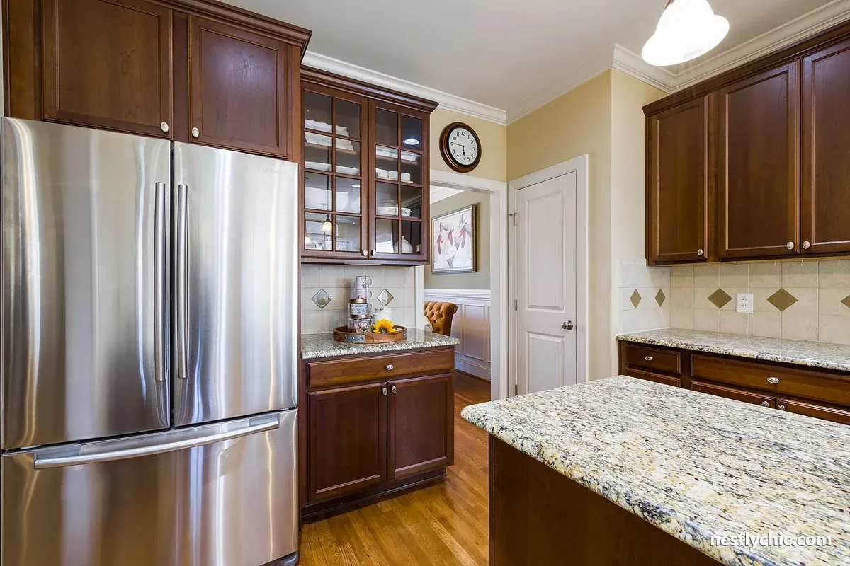 Kitchen with stainless steel appliances and wood cabinets