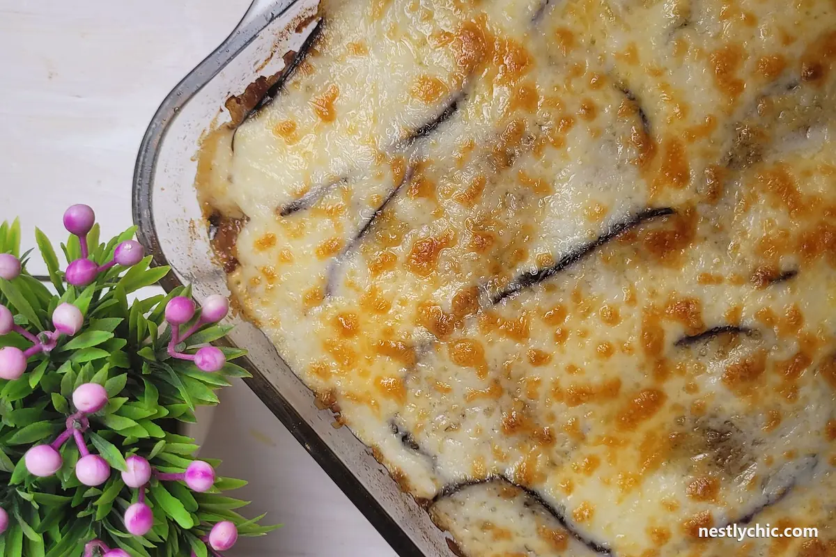 A cheesy eggplant casserole in a glass dish