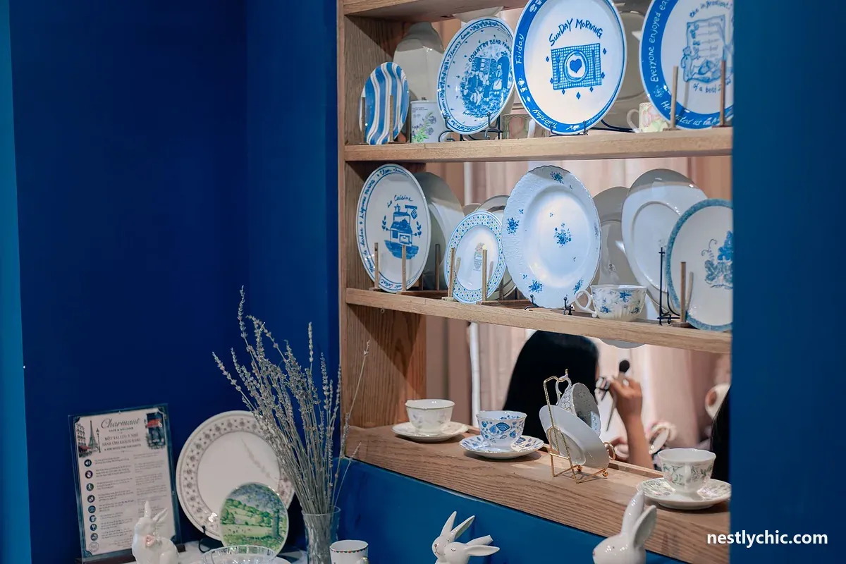 Vintage blue and white plates on a wooden shelf