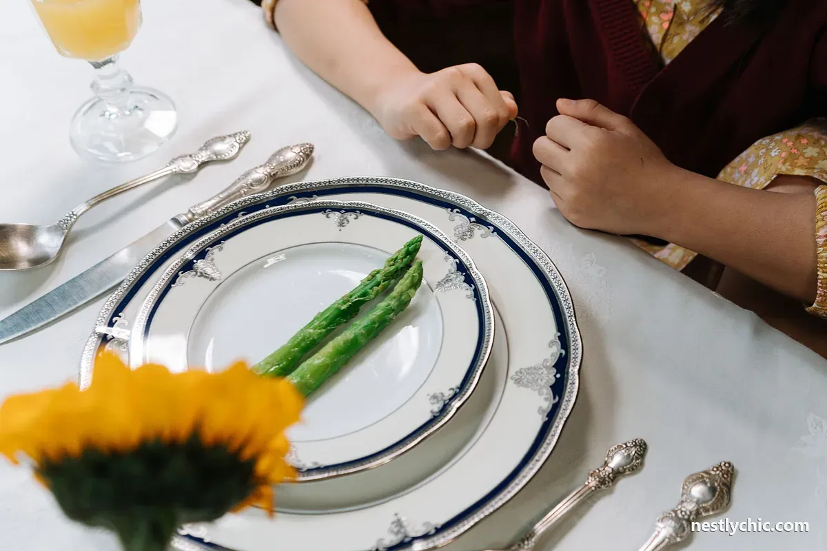 Formal dinner on fine china with silver cutlery