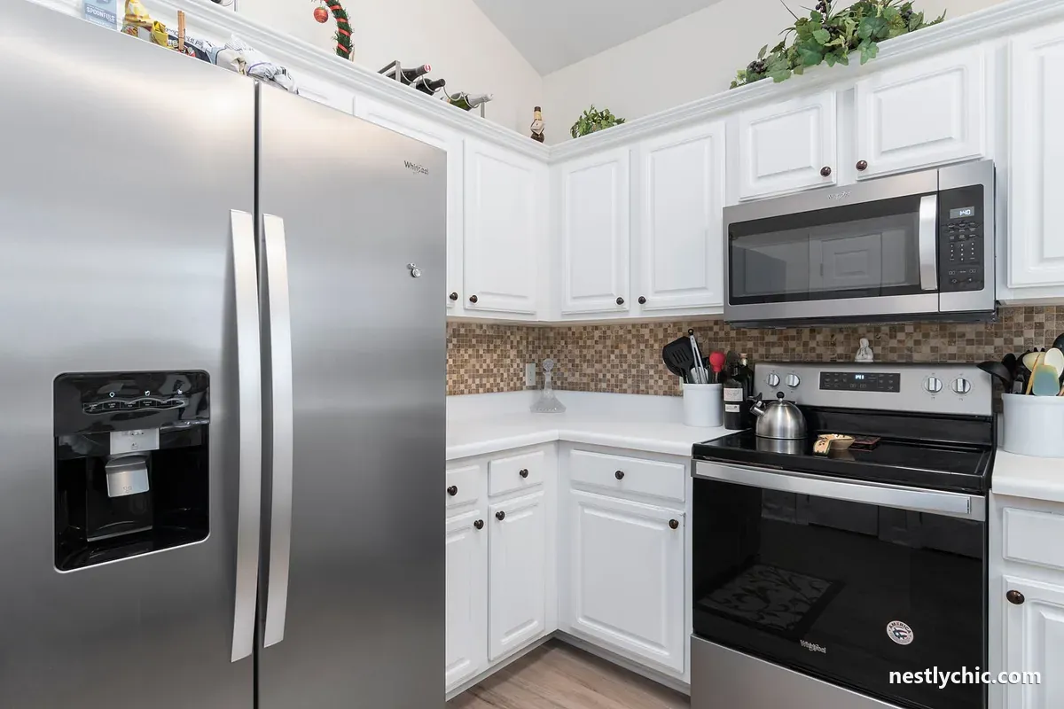 Kitchen with a stainless steel fridge and microwave