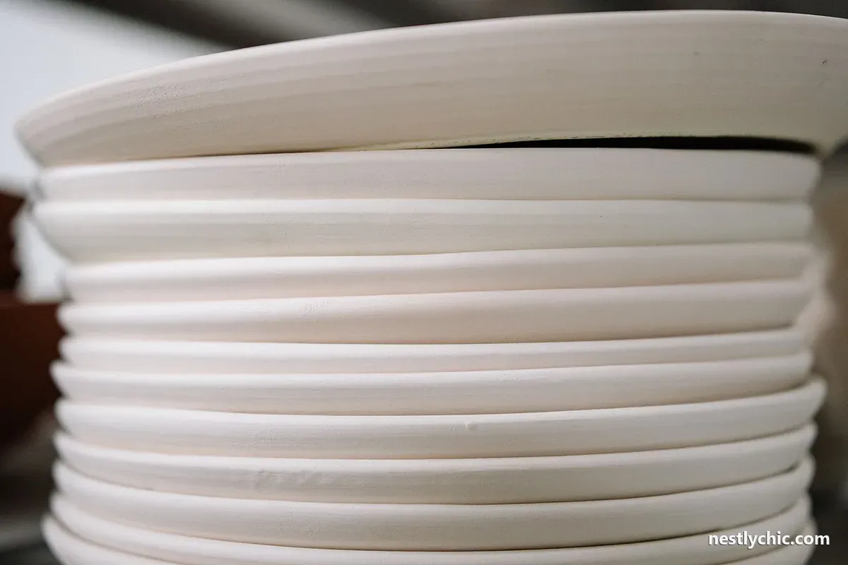 Stacked white porcelain plates