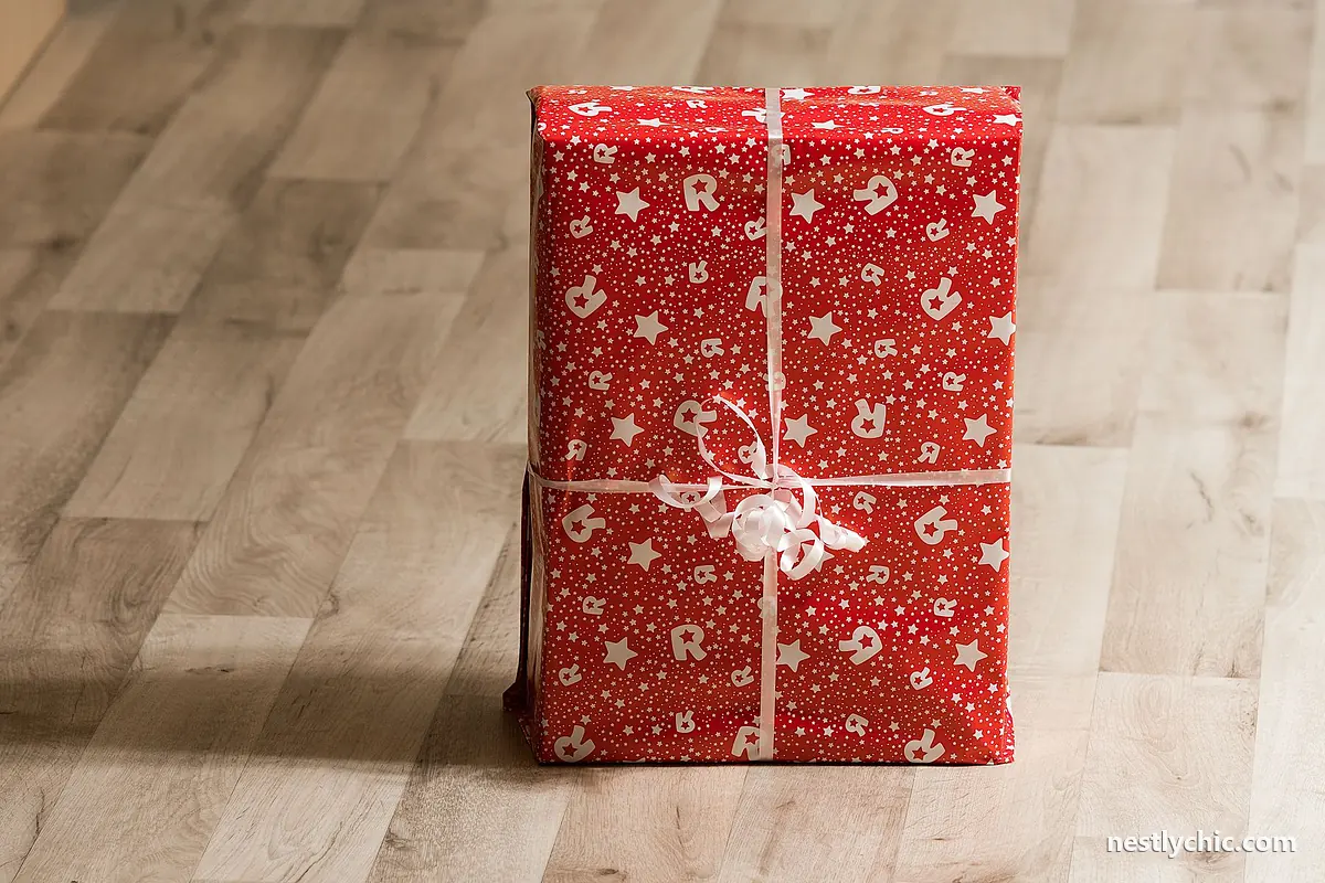 Wrapped gift box on a wooden floor