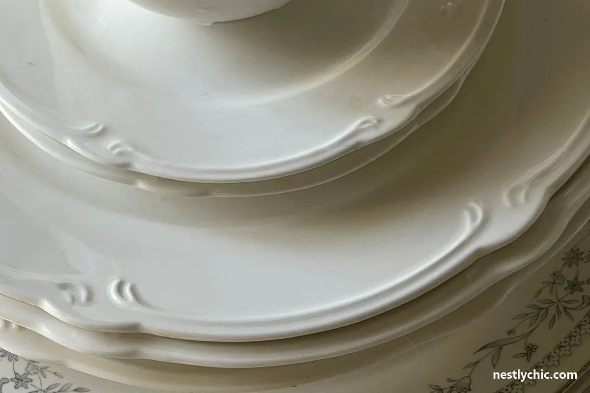A neat stack of white porcelain tableware