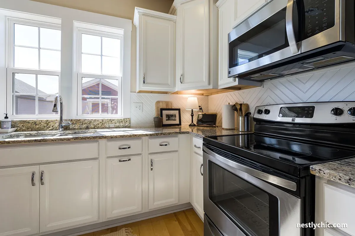 Modern kitchen with white cabinets and counter space
