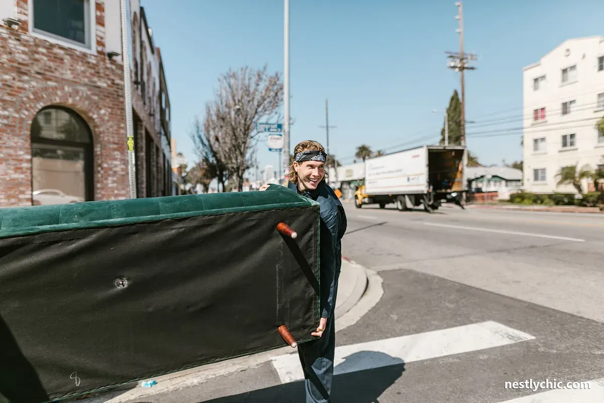 Carrying a large item through a doorway on moving day