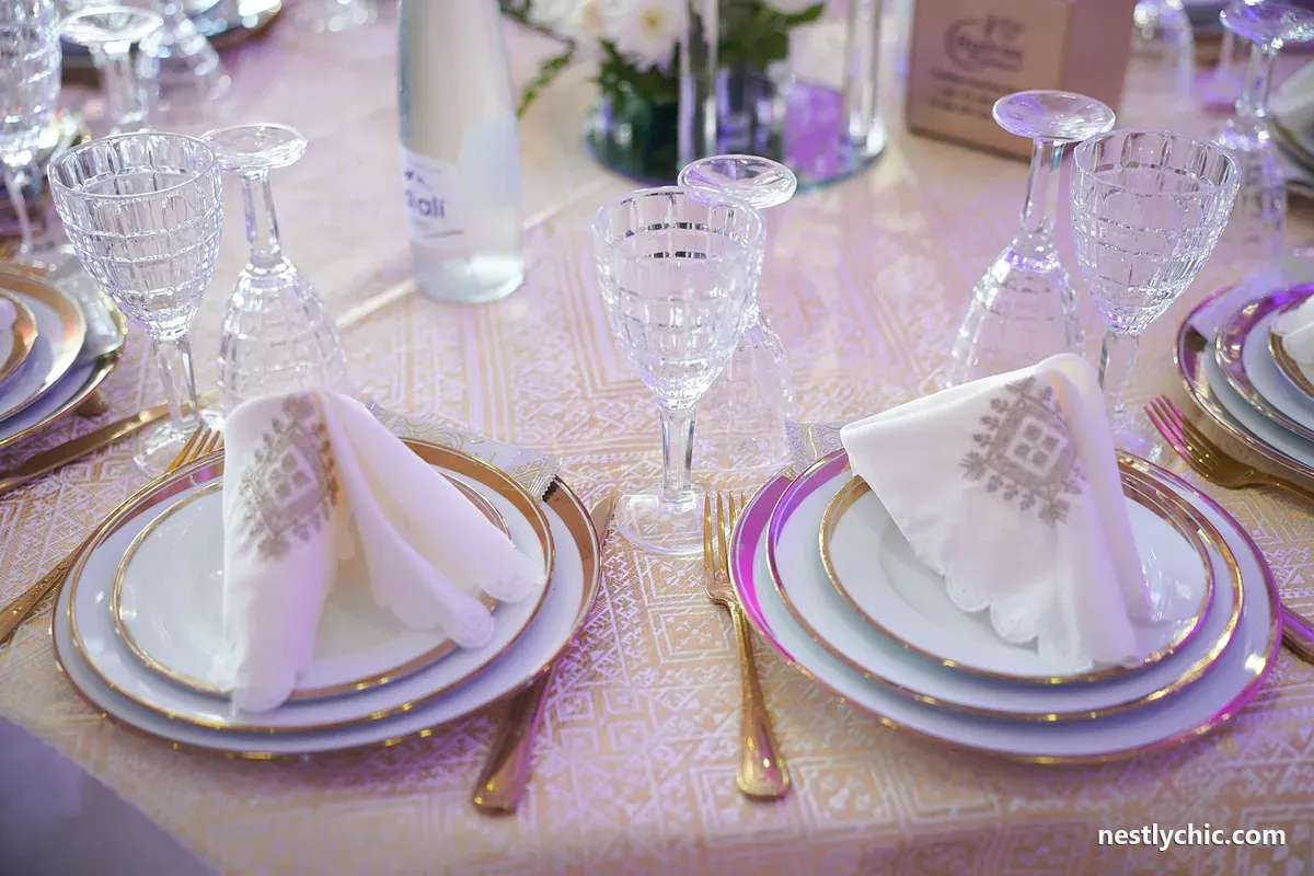 Formal table with glassware and folded napkins