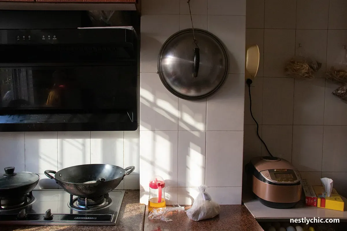 Sunlit kitchen with cookware and appliances