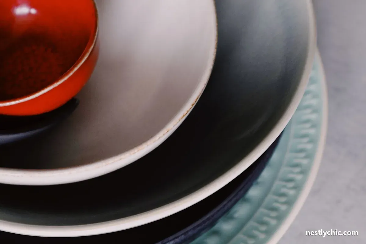 A stack of colorful ceramic bowls
